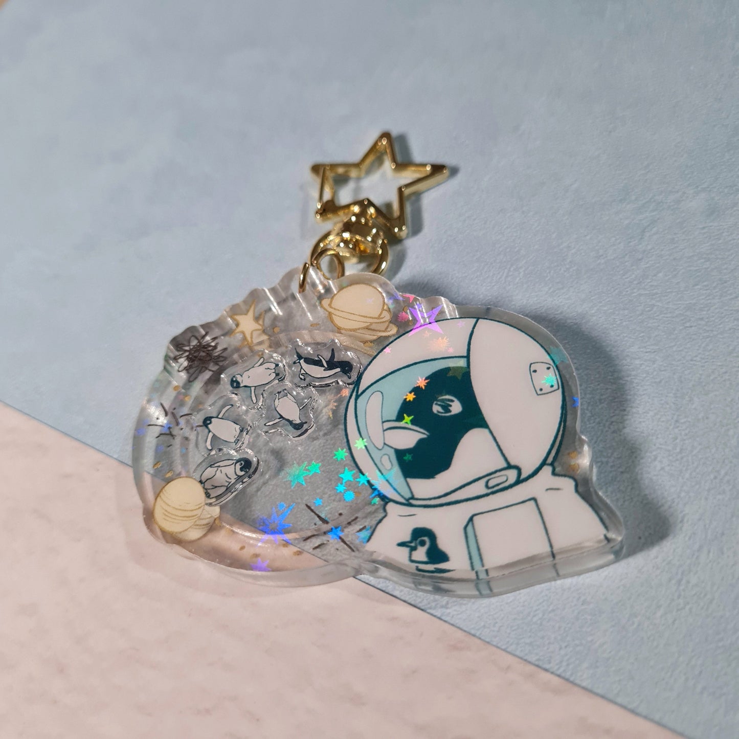 Close-up of Penguins in the Space Acrylic Shaker Keychain