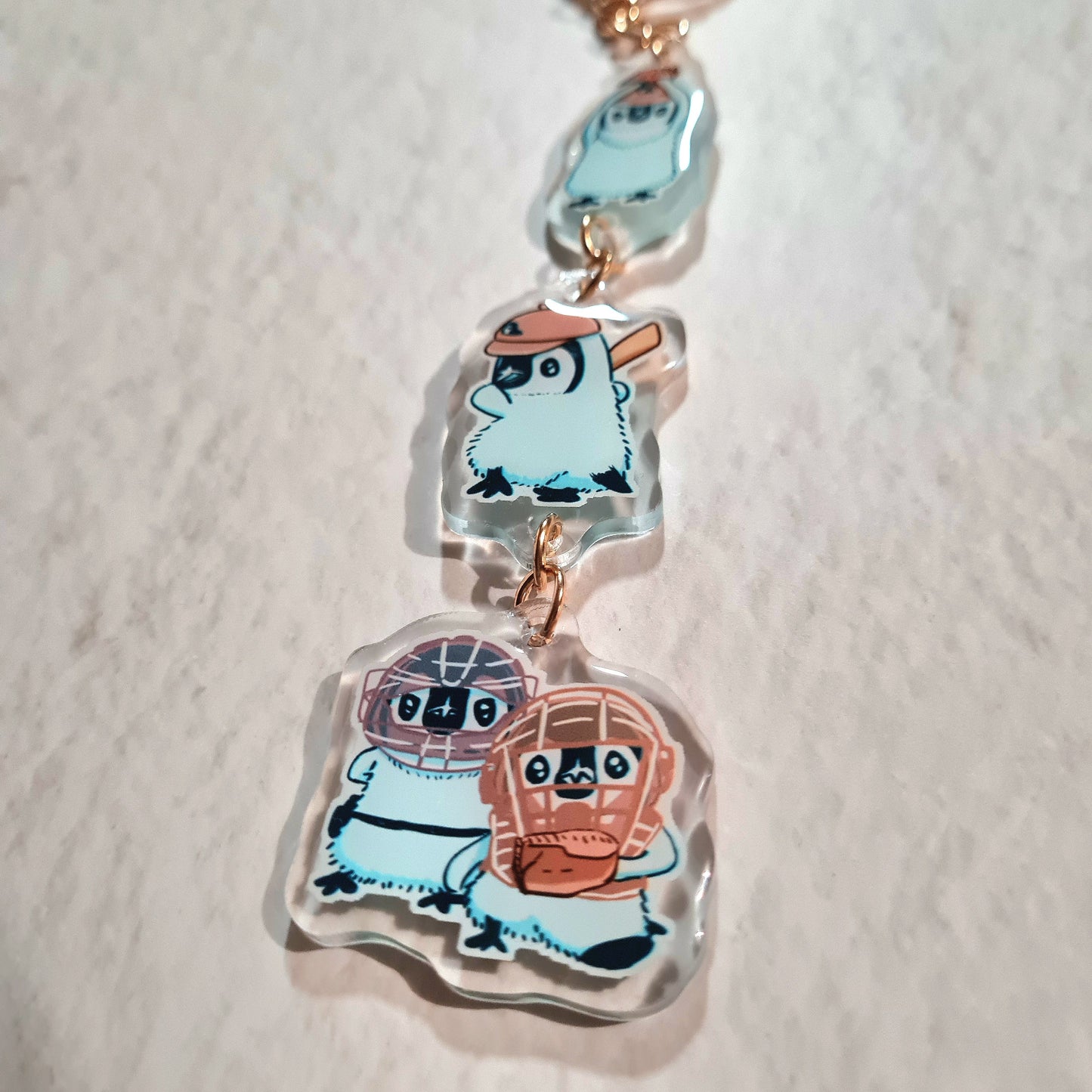 Close-up of Baseball Pipin Connected Acrylic Keychain