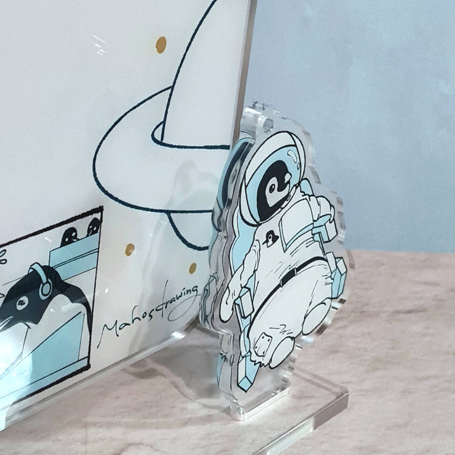 Close-up of Astronaut Penguins Acrylic Memo Standee from an angle