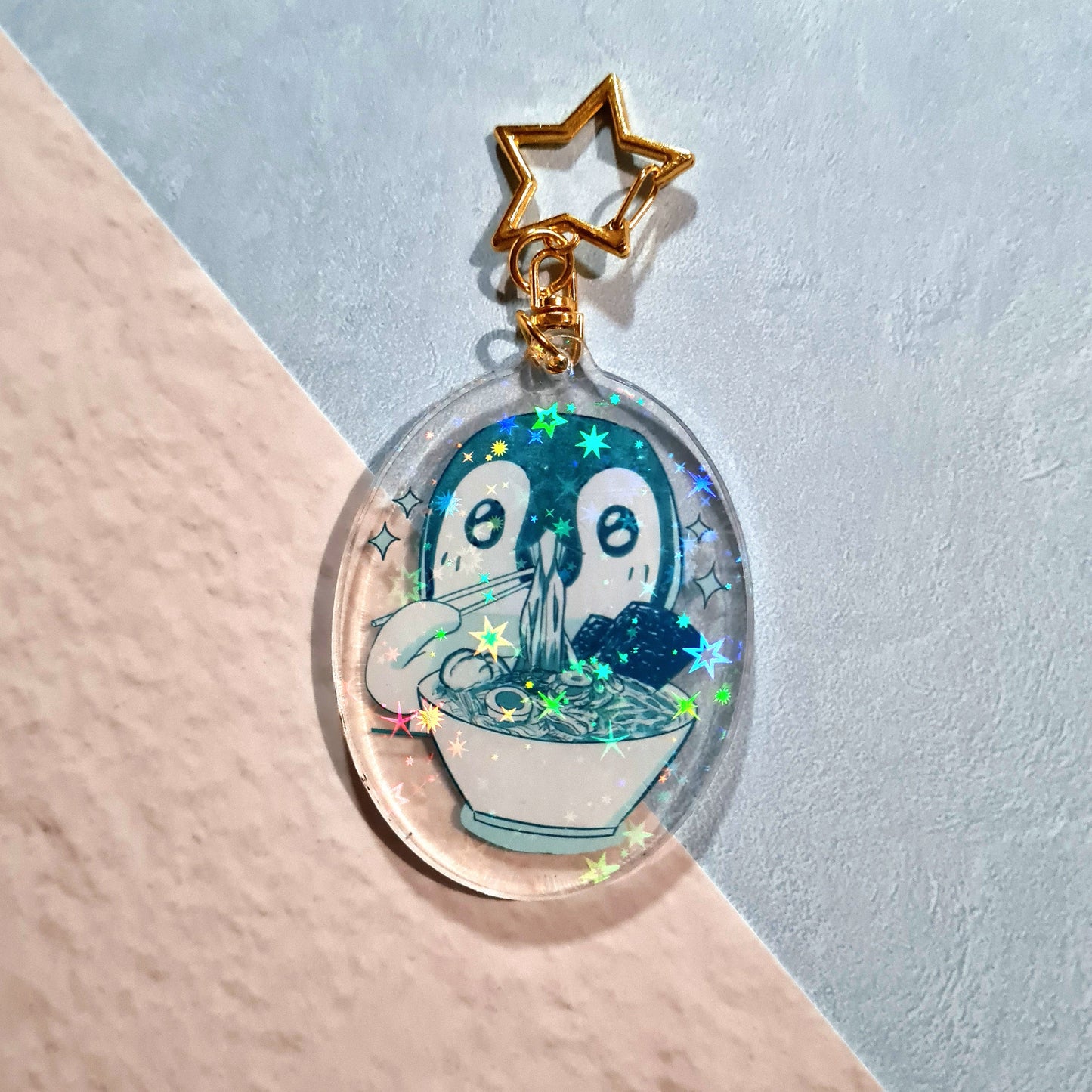 Backside of Eating Ramen Penguin Acrylic Keychain